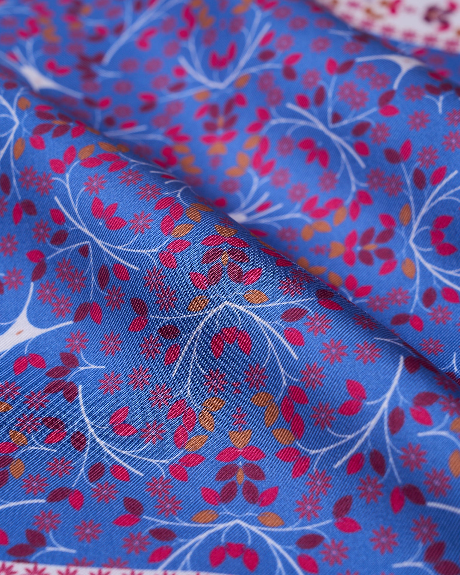 Pocket square - Blue with red and orange motif  - silk