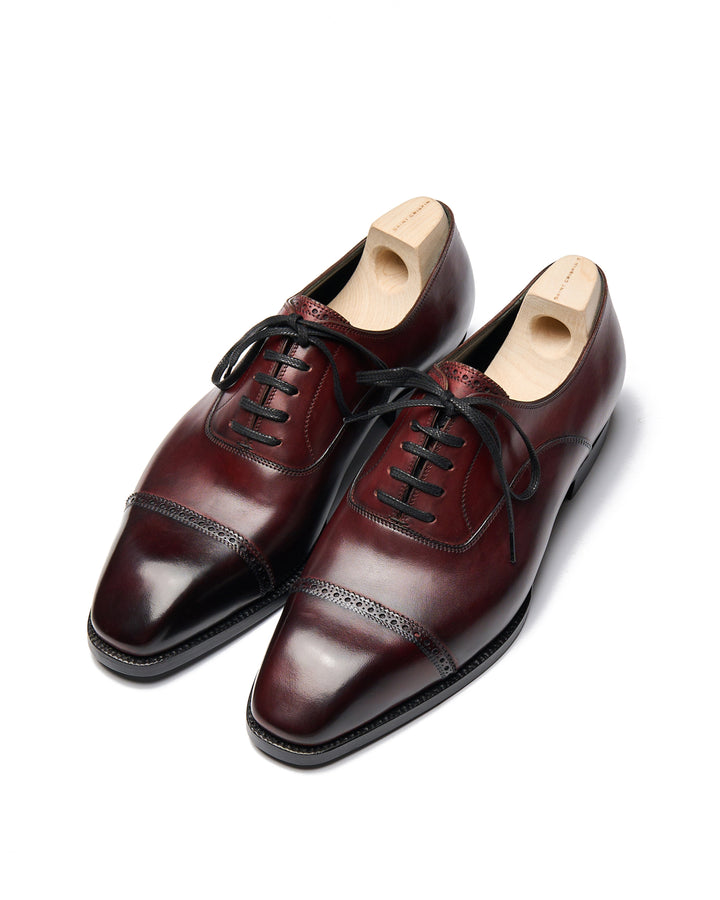 Cap toe oxford with brogue model 522C in burgundy calfskin
